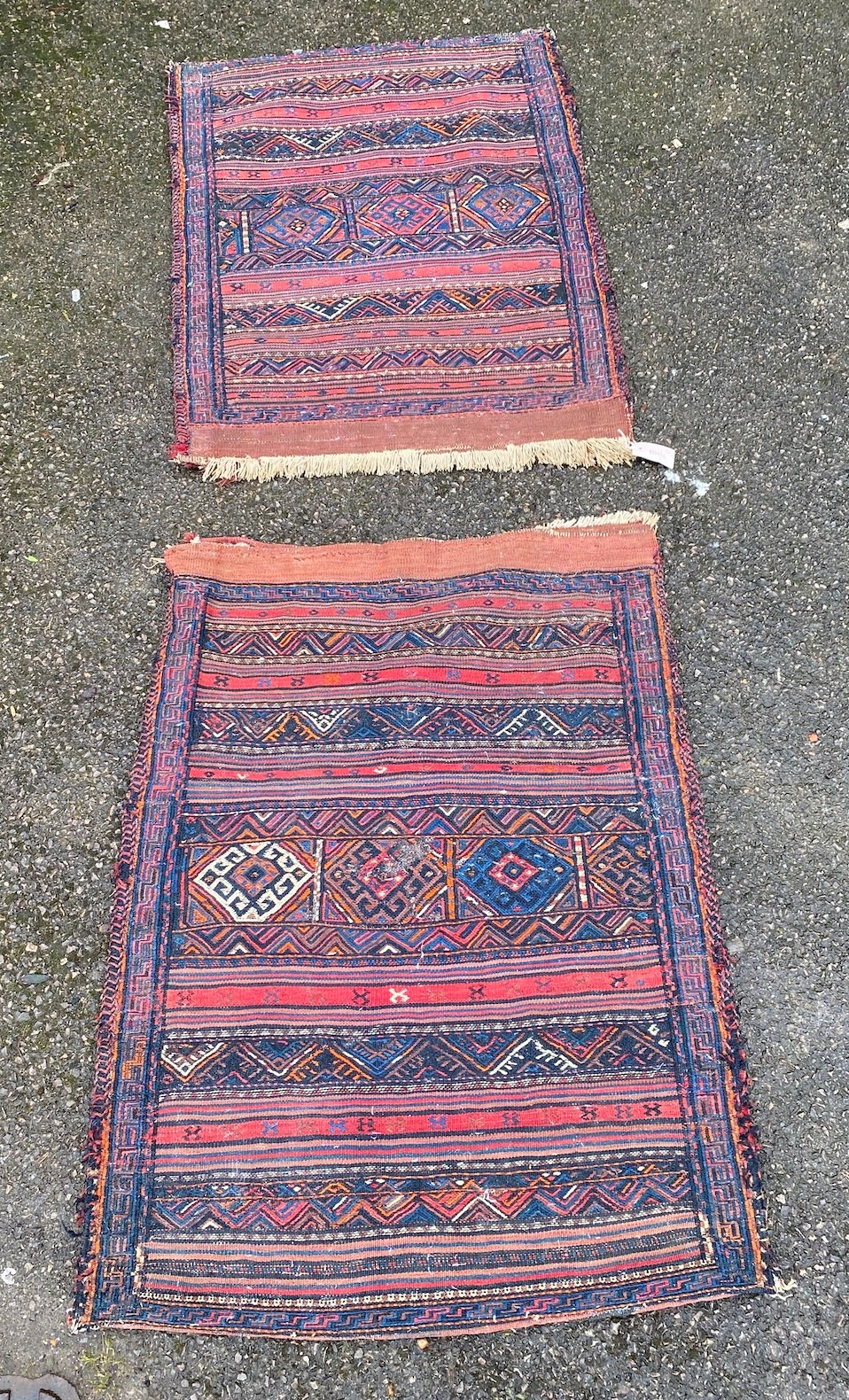 A near pair of Afghan polychrome salt bags, 100 x 73cm